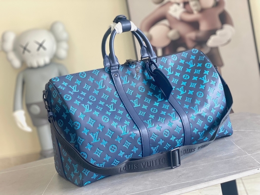 Τσάντα Keepall BANDOULIÈRE 50 των μεγάλων μαρκαρισμένη ατόμων μπλε τσάντες της Βοστώνης