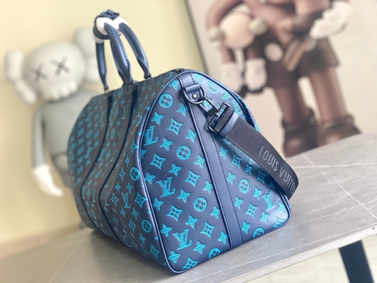 Τσάντα Keepall BANDOULIÈRE 50 των μεγάλων μαρκαρισμένη ατόμων μπλε τσάντες της Βοστώνης
